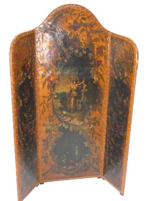 Lot 1301 - A Painted Leather Screen, of three leaves with an arched centre, painted all over with floral...