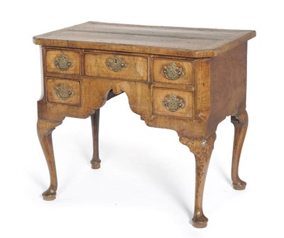 Lot 1308 - A George II Walnut Side Table, the rectangular quarter veneered top above a single frieze...