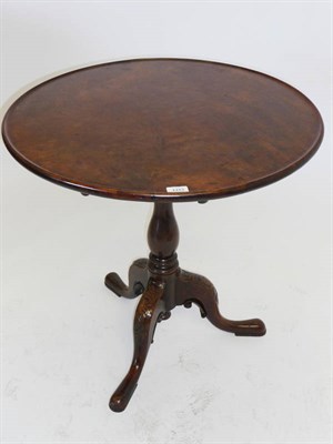 Lot 1313 - A George II Mahogany Tripod Table, the dished circular top on a box bird cage and baluster...