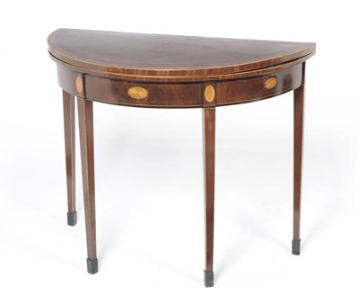 Lot 1314 - A George III Mahogany, Satinwood and Rosewood Crossbanded Card Table, the demi-lune foldover...