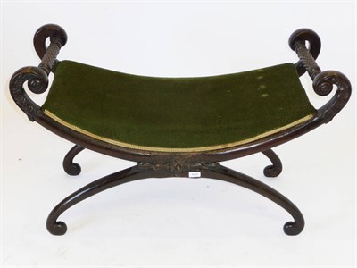 Lot 1317 - A Regency Mahogany Window Seat, the close nailed and padded seat upholstered in green velvet,...