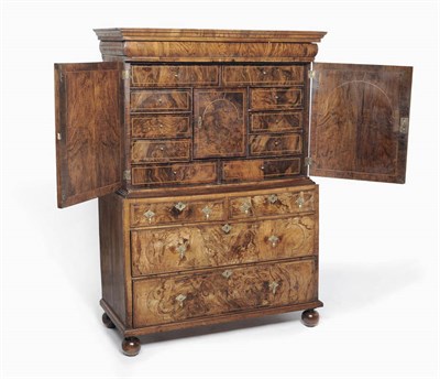 Lot 1325 - A William & Mary Walnut Cabinet on Chest, the stepped cornice over a cushion moulded drawer,...