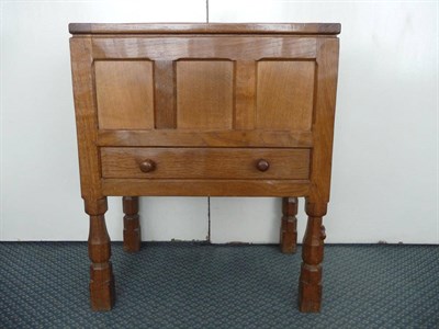 Lot 1107A - A Robert "Mouseman" Thompson Panelled Oak Workbox, with hinged top and a single fitted drawer,...