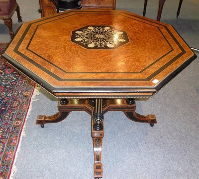 Lot 1290A - A Victorian Amboyna Ebonised Centre Table, by Edwards & Roberts, the octagonal top raised on...