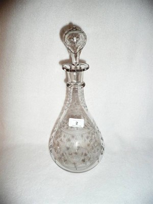 Lot 2 - An English Club Shape Decanter, late 19th century, decorated overall with wheel engraved...