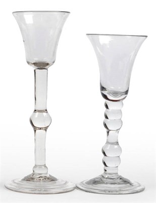 Lot 7 - A Balustroid Wine Glass, circa 1750, the bell bowl with inverted baluster knop on a plain stem,...