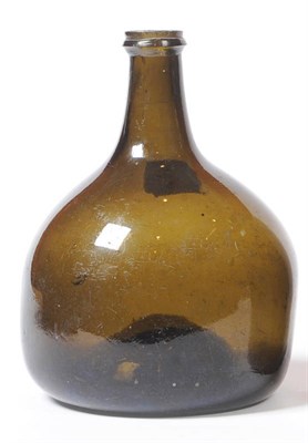 Lot 10 - An English Later Type Onion Bottle, circa 1725, of green/brown metal, with deep kick-up base,...