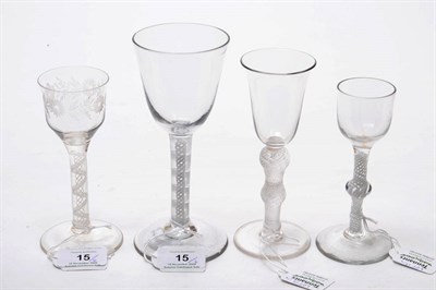 Lot 15 - A Wine Glass, circa 1765, the round funnel bowl on a double series opaque twist stem comprising...