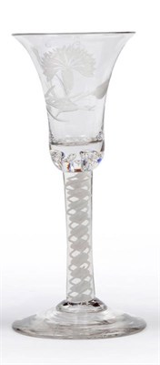 Lot 23 - A Composite Stem Wine Glass, circa 1750, the bell bowl engraved with a flowering carnation with two