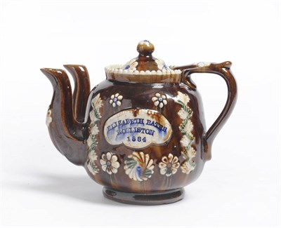 Lot 51 - A Measham Type Double Spouted Teapot, Elizabeth Bates Rosliston 1884, of compressed cushion...