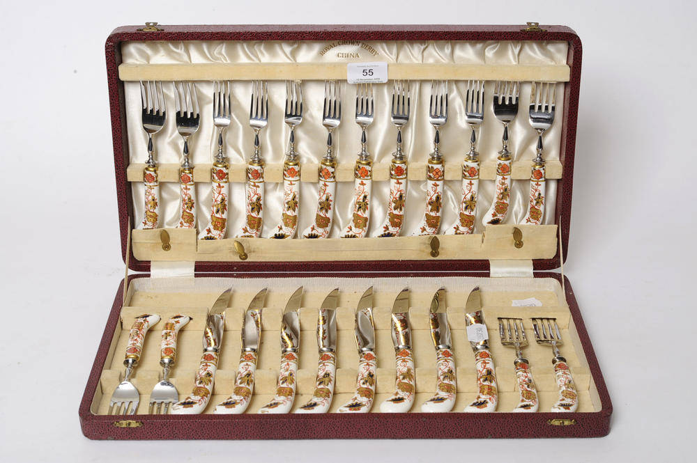 Lot 55 - A Set of Twelve Royal Crown Derby Porcelain-Handled Steak Knives and Forks, mid 20th century,...