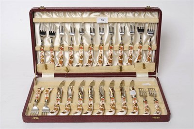 Lot 55 - A Set of Twelve Royal Crown Derby Porcelain-Handled Steak Knives and Forks, mid 20th century,...