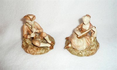 Lot 71 - A Pair of Royal Worcester Porcelain Figures of Musicians, 1899, he sits wearing a tricorn hat...