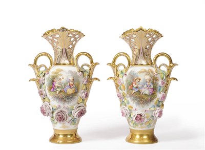 Lot 142 - A Pair of French Porcelain Encrusted Two-Handled Baluster Vases, circa 1820, with trellis...