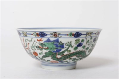 Lot 154 - A Chinese Famille Verte Porcelain Bowl, 19th century, of ogee outline, decorated with a red and...