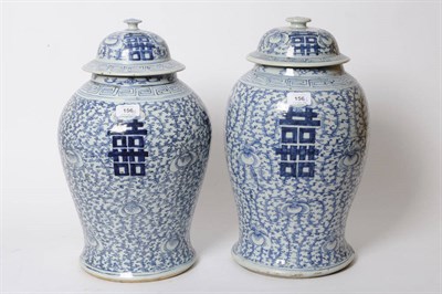 Lot 156 - A Matched Pair of Chinese Blue and White Porcelain Baluster Vases and Covers, 19th century, the...