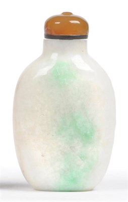 Lot 186 - A Chinese Jade Snuff Bottle, 19th century, of flattened ovoid form, the mottled white stone...