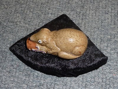 Lot 192 - A Porcelain Snuff Bottle as a Squirrel, probably circa 1820, modelled as a squirrel crouching...