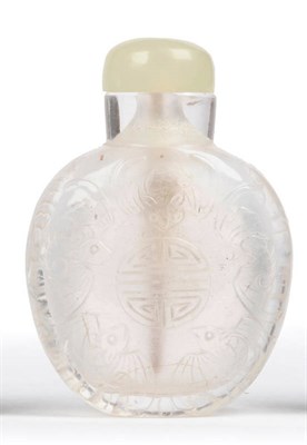 Lot 194 - A Rock Crystal Snuff Bottle, 19th century, of flattened spherical form, in relief on each side with