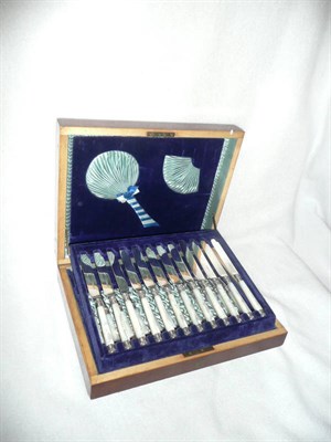 Lot 221 - A Set of Twelve Mother-of-Pearl Handled Fruit Eaters, maker's mark HH, Sheffield 1890, each...