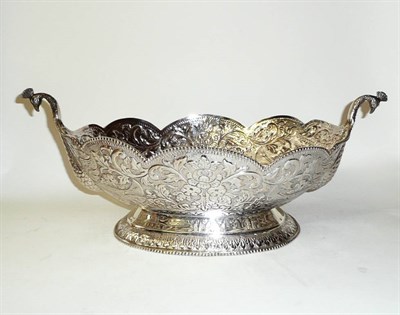 Lot 228 - An Indian White Metal Two-Handled Bowl, probably early 20th century, oval with arching and...