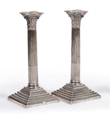 Lot 249 - A Pair of Edward VII Corinthian Column Table Candlesticks, Mappin Bros, Sheffield 1901, with beaded