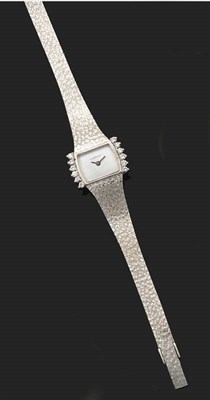 Lot 357 - A Lady's 18ct White Gold and Diamond Set Wristwatch, retailed by Garrard, circa 1975, 17-jewel...