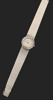 Lot 362 - A Lady's 18ct White Gold Diamond Set Wristwatch, retailed by Kitchinsky, London, 1970, 17-jewel...