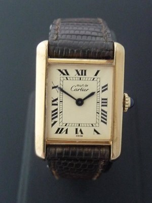 Lot 371 - A Lady's Rectangular Plated Wristwatch, signed must de Cartier, circa 2000, mechanical lever...