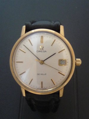 Lot 376 - A Gold Calendar Centre Seconds Wristwatch, signed Omega, De Ville, circa 1970, mechanical lever...