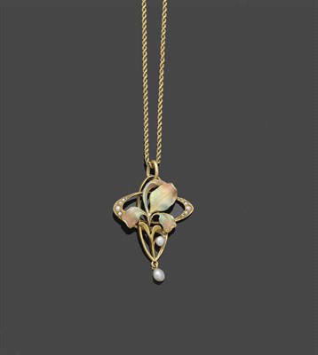 Lot 433 - An Art Nouveau Enamel and Seed Pearl Pendant on Chain, the leaf motif decorated in hues of...