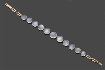 Lot 435 - A Moonstone Bracelet, the graduated cabochon moonstones in rubover settings on bar links,...