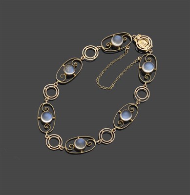 Lot 439 - A Moonstone Bracelet, by Murrle Bennet & Co., oval filigree links with a round cabochon...