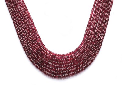 Lot 443 - A Multi Strand Red Spinel Necklace, eight strands of graduated faceted red spinel strung to a...