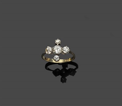 Lot 461 - A Diamond Cruciform Ring, the old brilliant cut diamonds arranged with the largest centrally,...