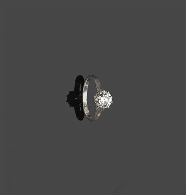 Lot 464 - A Diamond Solitaire Ring, the round brilliant cut diamond held in a white claw setting to a...