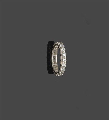 Lot 465 - A Diamond Full Eternity Ring, the round brilliant cut diamonds held in white claw settings on a...