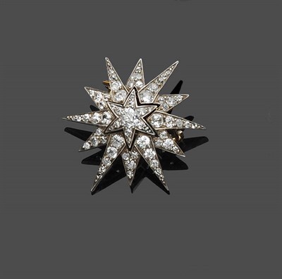 Lot 479 - A Victorian Diamond Star Shaped Brooch/Pendant, the old cut diamonds in claw settings with six long