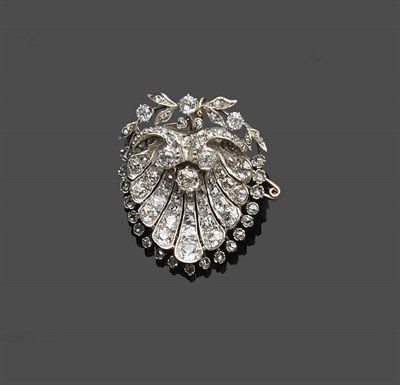 Lot 481 - A Diamond Brooch, the old cut diamonds claw set into a fan motif, total diamond weight 4.20...