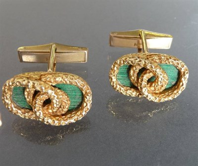 Lot 492 - A Pair of 18 Carat Gold Cufflinks, by Kutchinsky, entwined textured rope effect loops sit above...