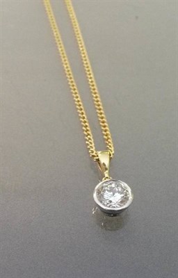 Lot 499 - A Diamond Solitaire Pendant on Chain, the round brilliant cut diamond in a white rubover mount to a