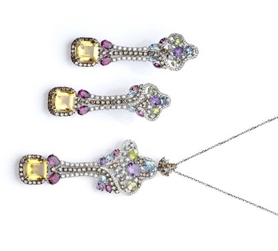 Lot 500 - A Multi Gem Pendant and Pair of Earrings, each piece has a cluster of amethyst, peridot,...