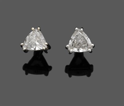 Lot 524 - A Pair of Trillion Cut Diamond Earrings, each diamond held in white claw settings, total...