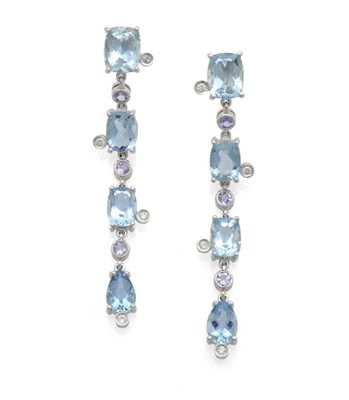 Lot 529 - A Pair of Aquamarine, Tanzanite and Diamond Drop Earrings, three cushion shaped aquamarines and...