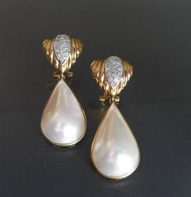 Lot 539 - A Pair of Diamond and Mabe Pearl Drop Earrings, round brilliant cut diamonds clustered within a...