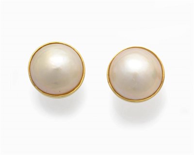 Lot 572 - A Pair of Mabe Pearl Stud Earrings, the domed mabe pearls within yellow rubover mounts, with...