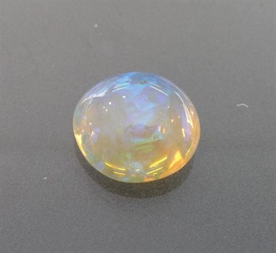 Lot 584 - A Loose Round Cabochon Opal, weighing approximately 9.00 carat, a medium grey background with a...