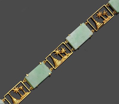 Lot 600 - A Jade Panel Bracelet, four rectangular jade pieces in yellow claw settings are spaced by four...