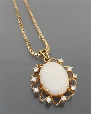 Lot 601 - An 18 Carat Gold Opal and Diamond Pendant on a 9 Carat Gold Chain, the oval cabochon opal...