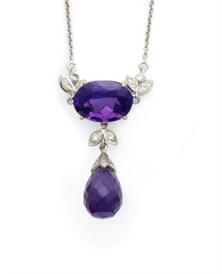 Lot 608 - An Amethyst and Diamond Necklace, an oval cut amethyst and a leaf motif diamond set link to a...